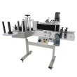 Automatic labeling machine for jars, glass bottles